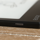 A close-up of the Onyx Boox Leaf 2's power button on its top edge.